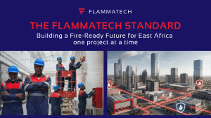 Fire safety professionals installing and maintaining fire protection systems alongside a modern city, representing Flammatech’s fire safety standards in East Africa.